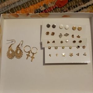 15 pairs of stud earrings and 2 dangly earrings